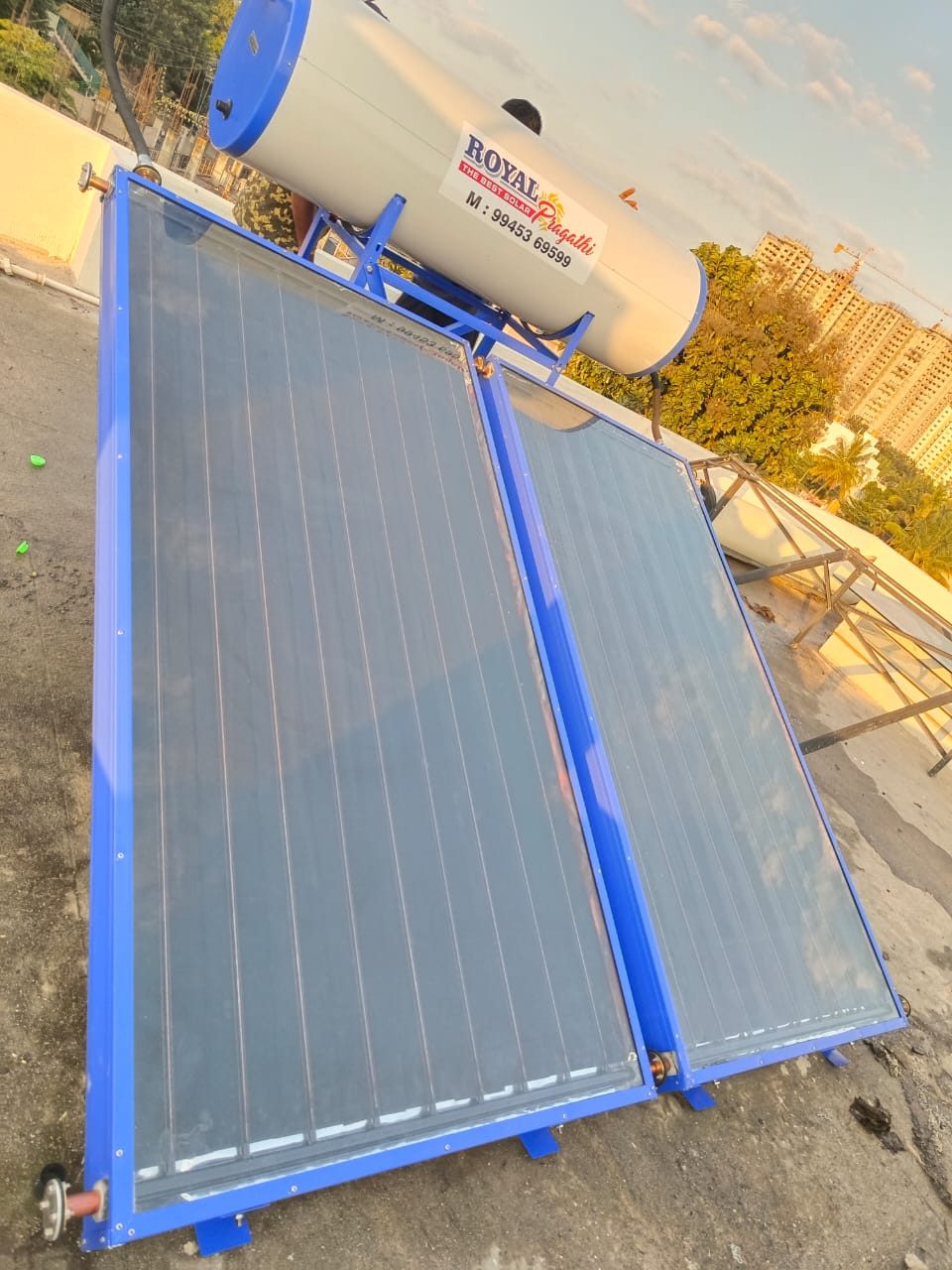 ROYAL PRAGATI flat plate collector solar water heater on rooftop